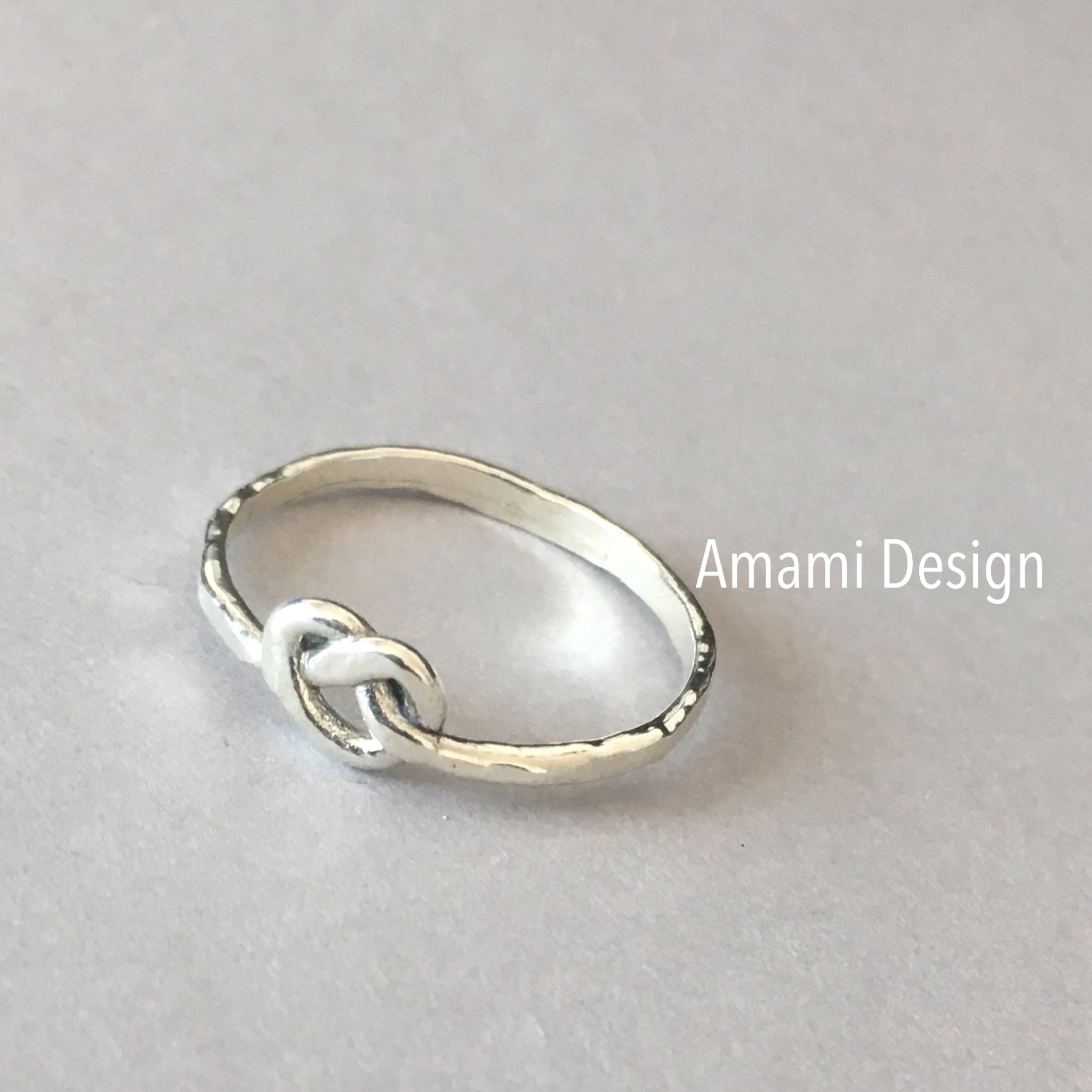 Hammered love knot ring