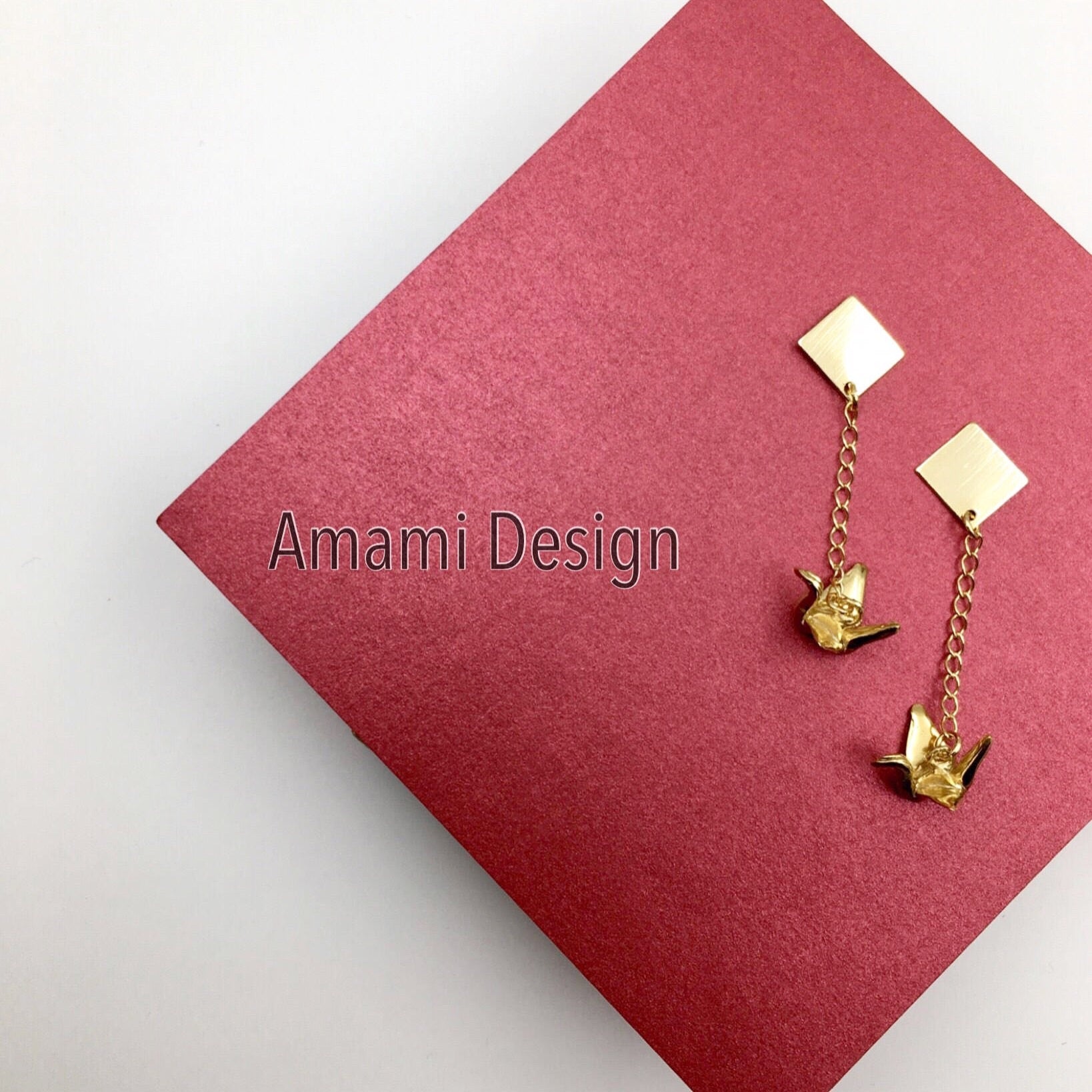 14K gold plated silver crane earrings.