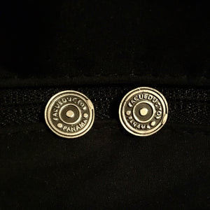 Panamanian manhole studs earrings.